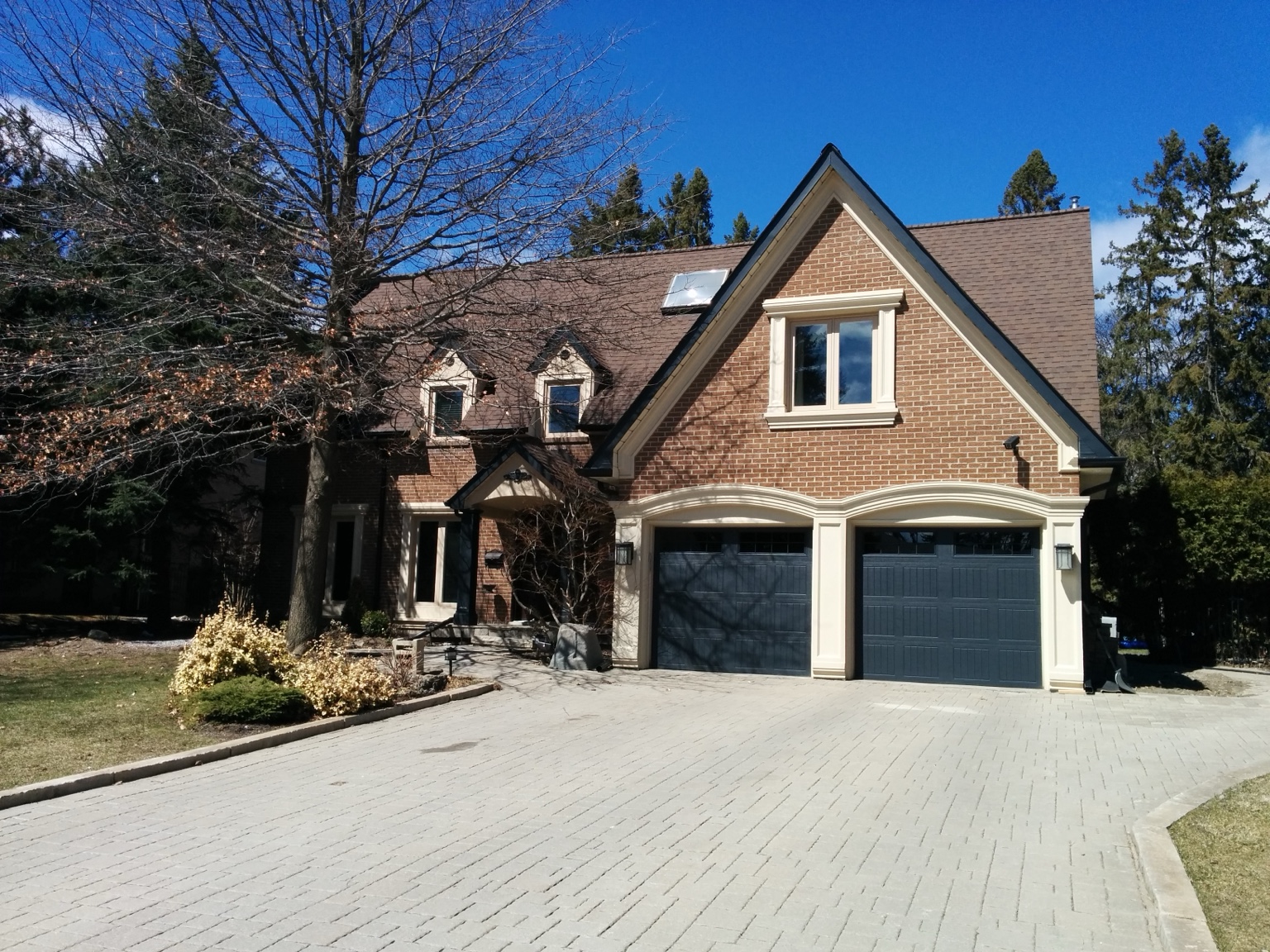 Brick Home Upgrade — Window & garage surrounds